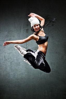 Young woman dancer jumping clipart