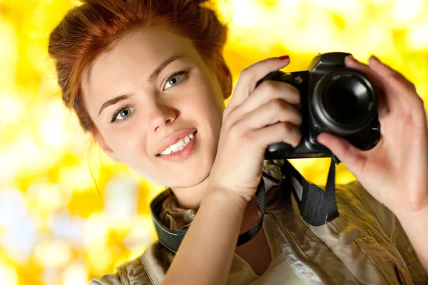 Young woman photographer — Stock Photo, Image