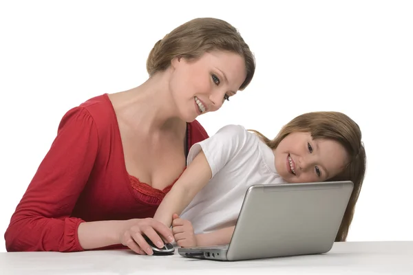 Moeder en dochter met laptop Stockfoto