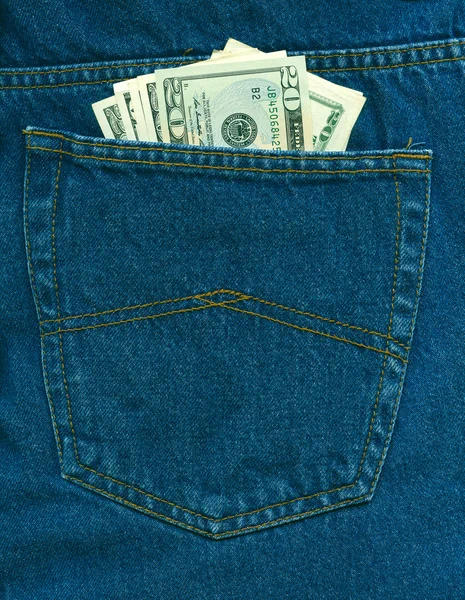Dollar in een jeans zak — Stockfoto