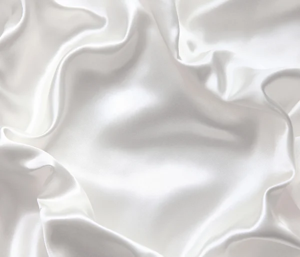 Гладкий элегантный белый шелк — стоковое фото