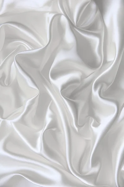 Гладкий елегантний білий шовк може використовуватись як весільний фон — стокове фото