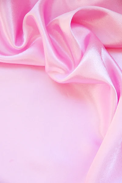 Hladké elegantní růžové hedvábí jako pozadí — Stock fotografie
