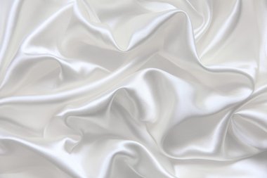 Smooth elegant white silk as wedding background clipart