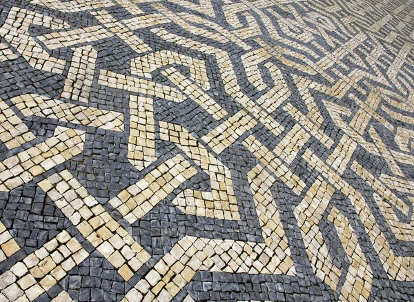 Portugal. Lisbon. Typical portuguese cobblestone pavement — Stock Photo, Image
