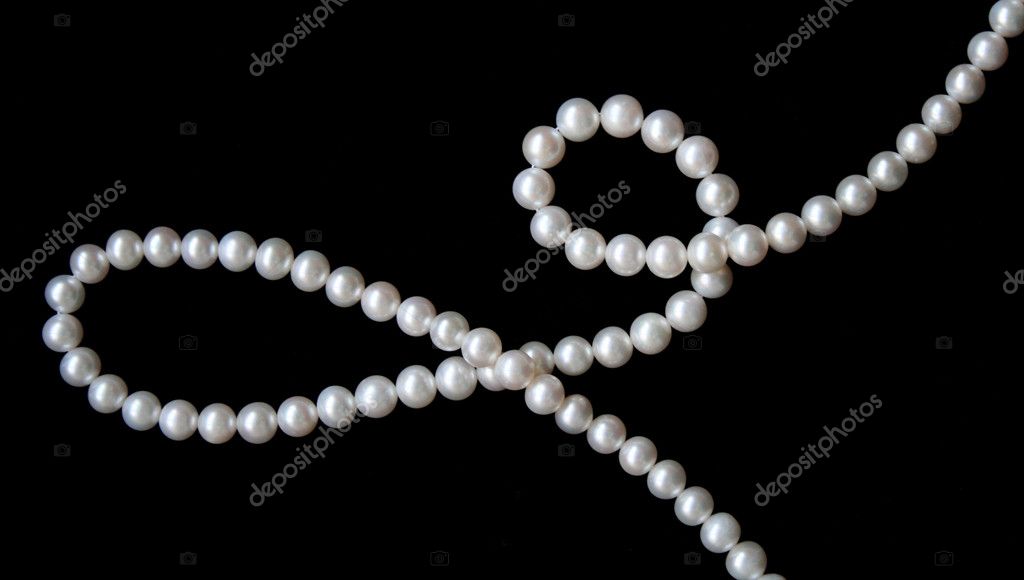 White pearls on the black velvet Stock Photo by ©oxanatravel 5830734