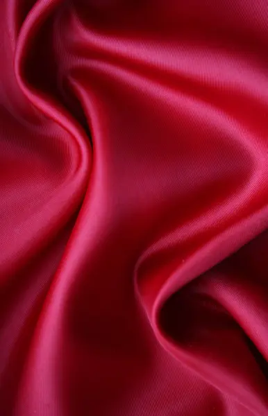 滑らかな赤い絹の背景として — ストック写真