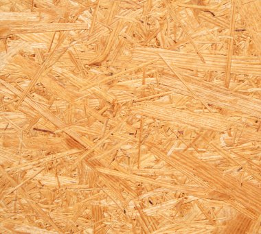 Yellow wood chipboard as background clipart