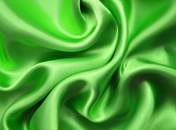 Soepele elegante groene zijde als achtergrond — Stockfoto