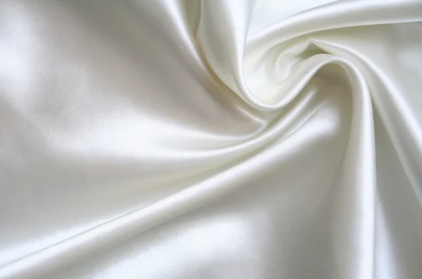 Gładkie elegancki biały jedwab jako tło — Zdjęcie stockowe