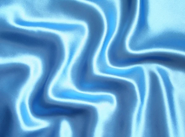 Sima, elegáns kék selyem háttereként — Stock Fotó