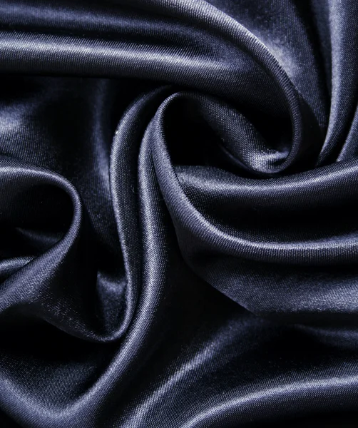 Glatte elegante schwarze Seide — Stockfoto