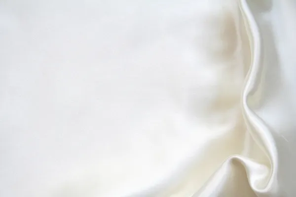 Gladde elegante witte zijde kan worden gebruikt als achtergrond — Stockfoto
