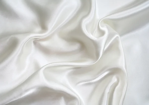 Soepele elegante witte zijde als achtergrond — Stockfoto