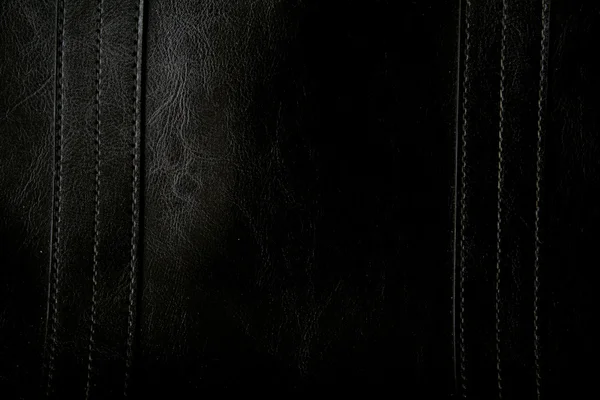 Szczelnie-do góry czarne skórzane tekstury w tle — Zdjęcie stockowe