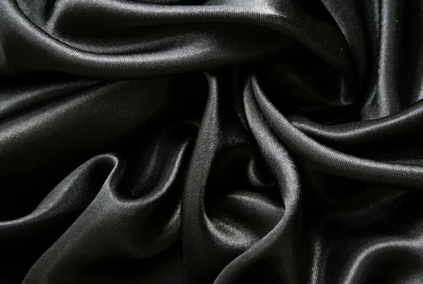 Slät elegant svart silke som bakgrund — Stockfoto