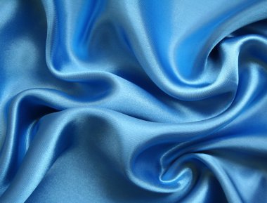 Smooth elegant blue silk as background clipart