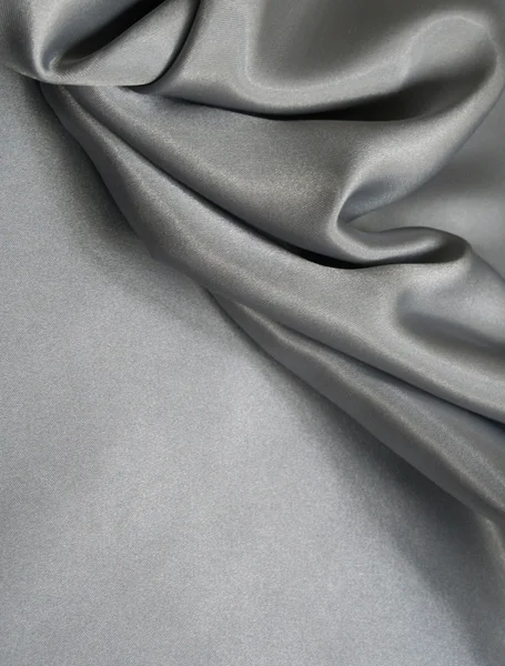 Hladké elegantní šedé hedvábí jako pozadí — Stock fotografie
