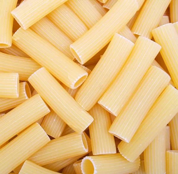 Pasta on the wooden background — Stock Photo, Image