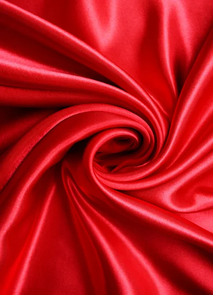 Glatte rote Seide als Hintergrund — Stockfoto