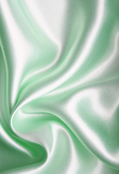 光滑优雅绿色丝绸作为背景 — 图库照片