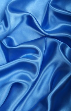 Smooth elegant blue silk as background clipart