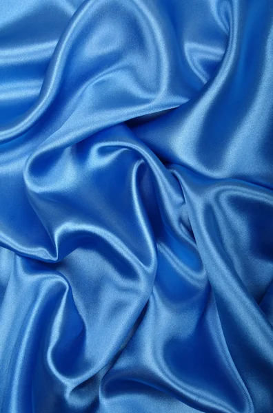Glatte elegante blaue Seide als Hintergrund — Stockfoto