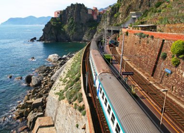 Italy. Cinque Terre. Train at station Manarola clipart