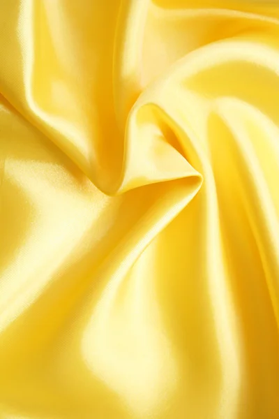 Smooth elegant golden silk can use as background — Stock Photo, Image