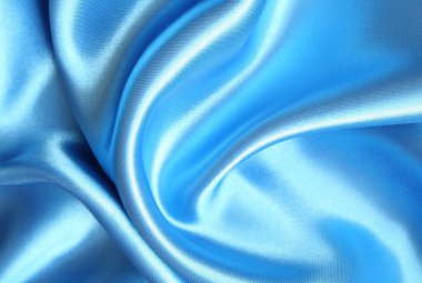 Smooth elegant blue silk as background clipart