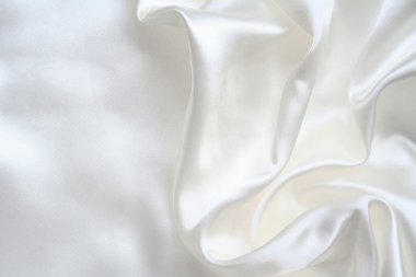 Smooth elegant white silk as wedding background clipart