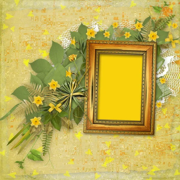 Old wooden frame for photo with bunch of flower — Stock Photo, Image