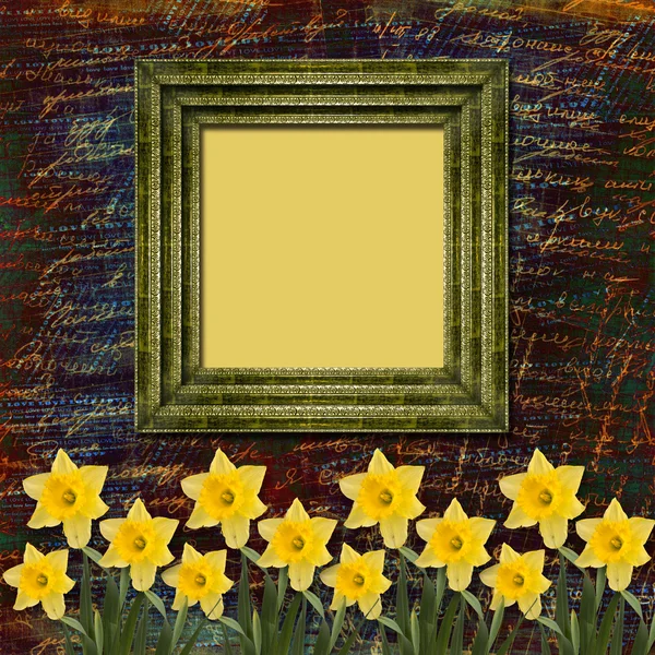Old wooden frame for photo with bunch of flower — Stock Photo, Image