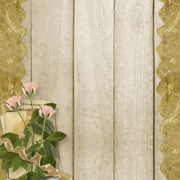 Antiguo fondo de madera con marco y ramo de flores — Foto de Stock