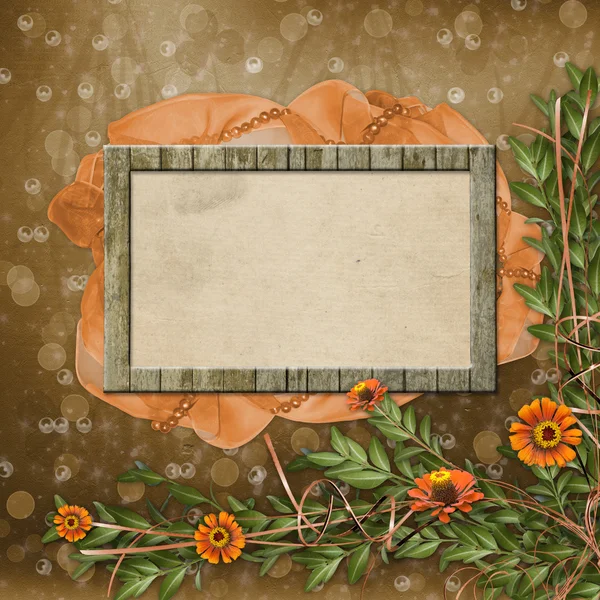 Wooden frame for photos with bunch of flowers — Stock Photo, Image