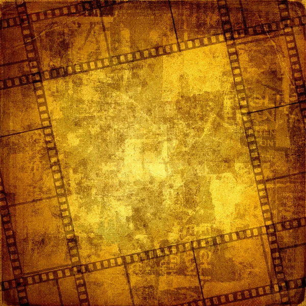 Old frame and grunge filmstrip on the grunge background — Stock Photo, Image