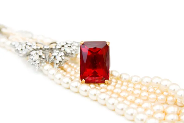 Red ruby ring and pearls — Stock Photo, Image
