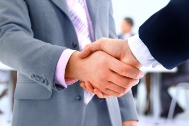 Handshake isolated on business background clipart