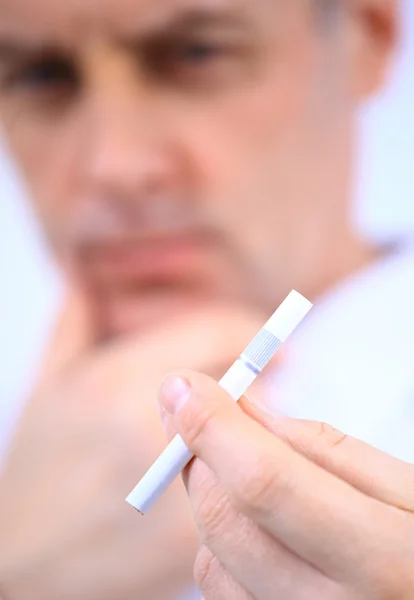 Stock image Man holding cigarette