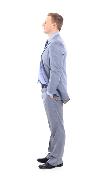 Full length of a handsome business man with hands folded against white back — Stock Photo, Image
