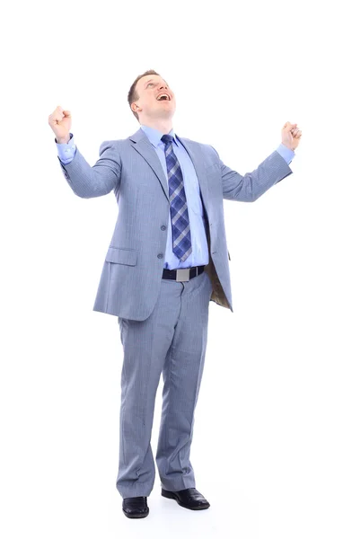 Volledige lengte van een knappe zakenman met handen gevouwen tegen witte rug — Stockfoto