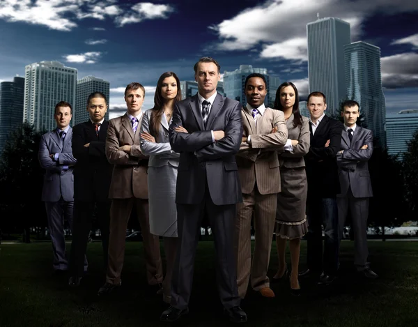 International business team over modern urban background — Stock Photo, Image