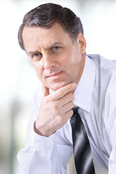Face of gently smiling mature business man — Stock Photo, Image