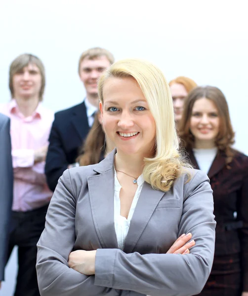 Młody atrakcyjny biznes kobieta i jej zespołu — Zdjęcie stockowe