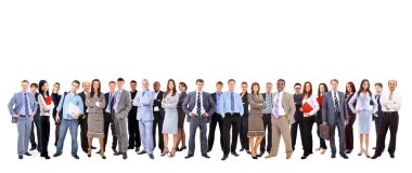 Business team formed of young businessmen and businesswomen standing over a