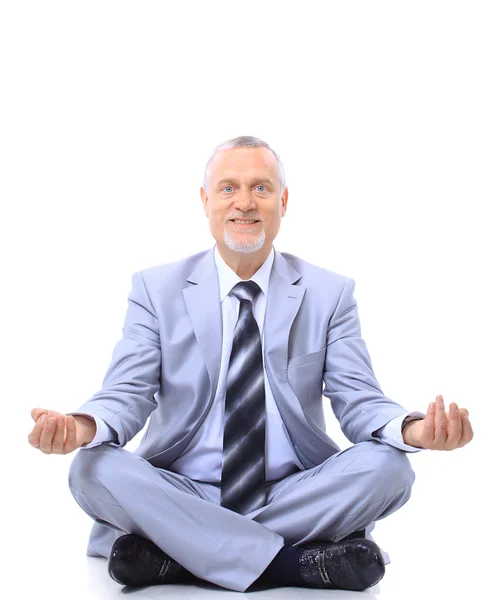 Ontspannen zakenman mediteren op geïsoleerde Wit — Stockfoto