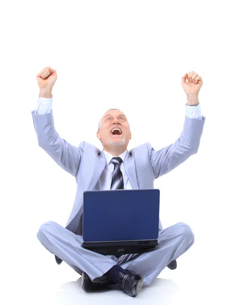 Ο άνθρωπος των επιχειρήσεων γιορτάζει την επιτυχία του με ένα φορητό υπολογιστή του υπολογιστή — Φωτογραφία Αρχείου