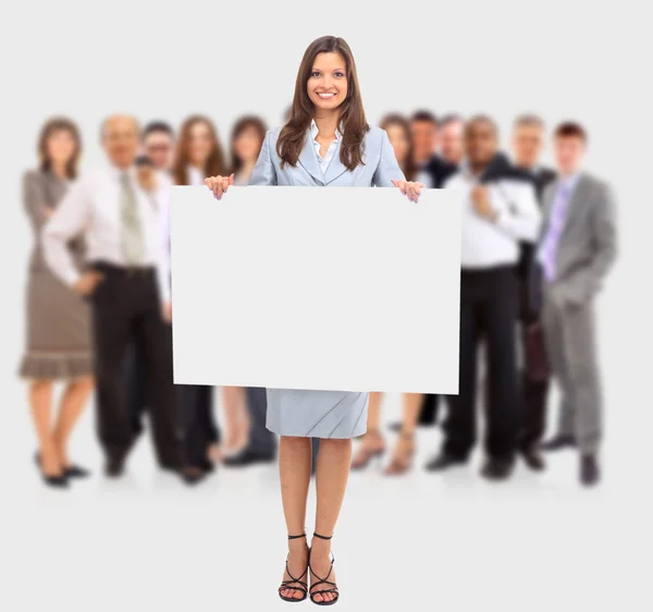 Isolat d'une femme d'affaires debout à côté d'un tableau blanc — Photo