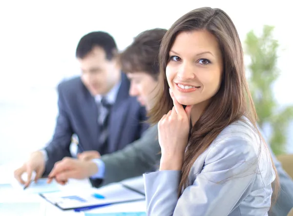 Portrait of successful businesswoman and business team at office meeting — Stockfoto
