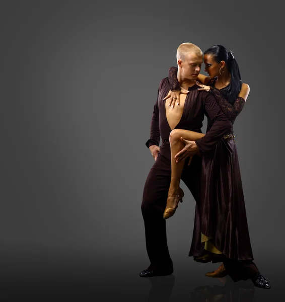 Dancers against black background — Stock Photo, Image